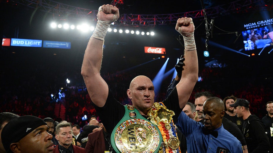 Boxing star Tyson Fury announces retirement following losses to