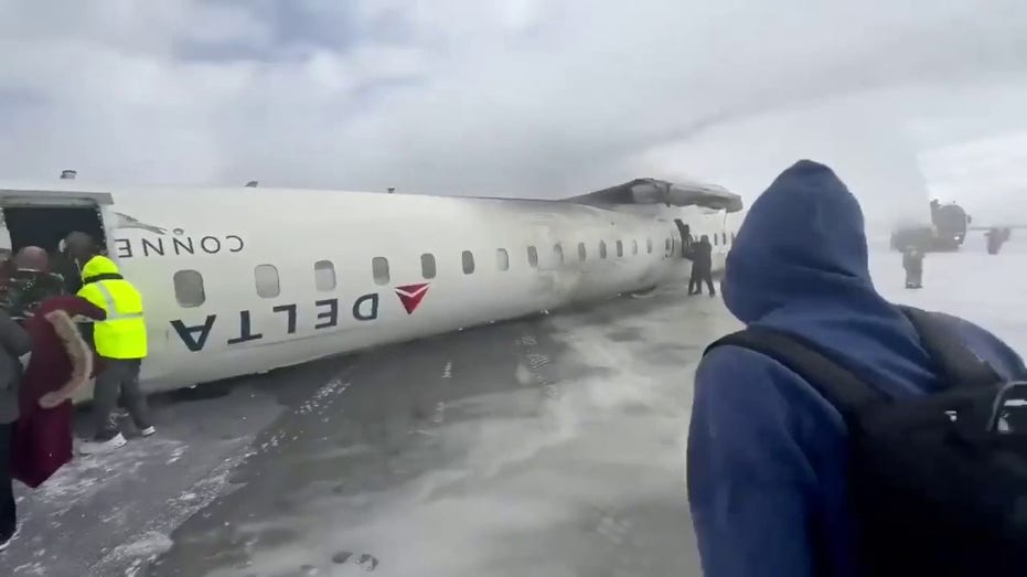 Toronto plane crash timeline Delta flight from Minneapolis flips